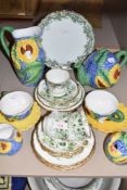 A part breakfast set having moulded sunflower design if blue ground including cups and saucers,