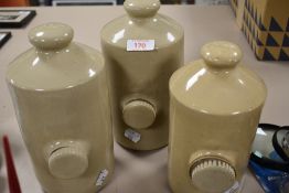 Three earthen ware salt glazed bed warmers