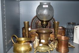 A selection of brass and copper wares including fish steamer hand worked arts and crafts style