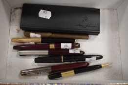 A selection of desk top fountain and similar ball point pens including Parker