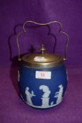 A jasper ware biscuit barrel by Wedgwood having Grecian scene