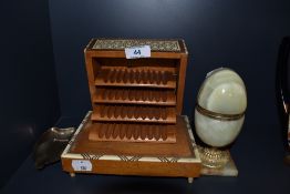 A micro mosaic smokers cigarette container