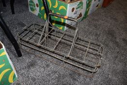 A vintage dairy or farm stead dozen milk bottle or similar beer bottle carrier