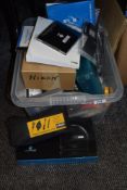 A selection of camera and similar equipment including rechargeable battery packs