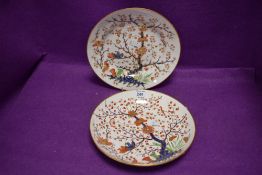 Two early Royal Crown Derby ceramics bearing red painted back stamp one plate having antique repair