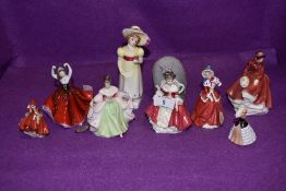 A selection of Royal Doulton figurines of small sizes including Lori