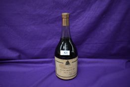 A bottle of Grand Reserve 1855 Armagnac, bottled 1938, retailed by Sandeman & Calrow, London &
