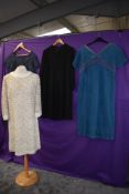 Four vintage 1950s and 60s dresses, three of which are lace, one being Blanes and another Riviera.