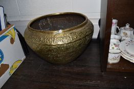 An antique large Indian hand worked bowl or planter depicting flora forna and elephant approx 38cm