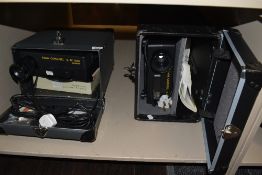 Two Kodak Carousel S-AV103 projectors.