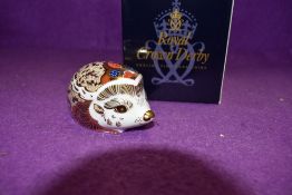 A Royal Crown Derby Paperweight Bramble Hedgehog, boxed with Gold Stopper