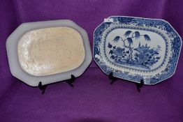A pair of Chinese export hard paste serving dished or chargers decorated with traditional fantasy
