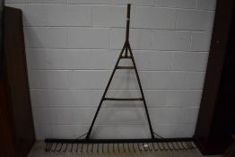 A vintage hay or muck rake