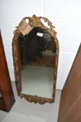 A traditional gilt frame wall mirror , foliate design, approx. 74 x 33cm