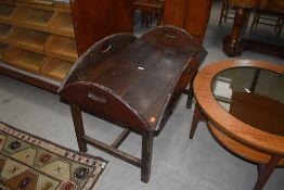 A vintage stained frame butlers tray on stand, of large proportions approx. 90 x 58cm