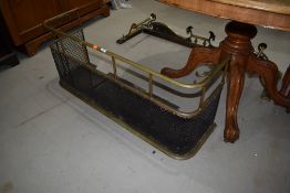 A traditional brass and wirework fender, width approx. 108cm, height 46cm