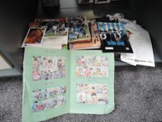 A shelf of early 21st century Sporting and Entertaiment memorabilia including many northern football