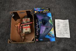 A 1990's Universal Studios Inc plastic Jurasic Park Land Rover, figure and two dinosaurs along