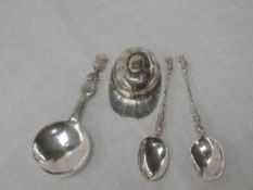 A silver caddy spoon in the form of a jockey's cap, Sheffield 1912, Thomas Bradbury & Sons Ltd,