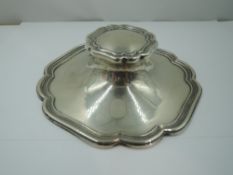 A silver capstan inkwell of plain canted square form with raised rim, Sheffield 1910, Hawksworth
