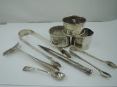 A pair of Georgian silver sugar nips having bright cut decoration, makers mark FPBG, three HM silver