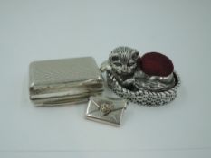A modern HM silver pin cushion in the form of a cat in her basket, Sheffield Assay office, a small