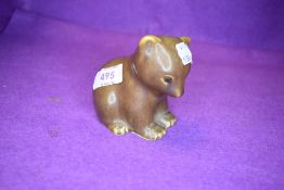 A mid century studio pottery bear cub or similar marked underside with KB 3/55.