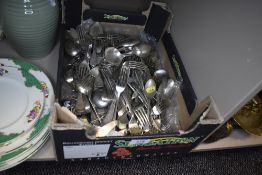 A box full of vintage flatware.