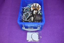 A large selection of costume jewellery bracelets of various forms