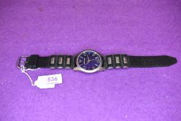 A gent's wrist watch by Emporio Armani, model no: AR-1011 having baton & Arabic numeral dial to blue