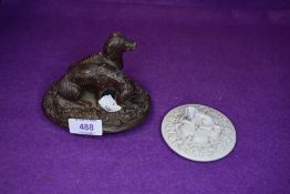 Two antique lids having spaniel detail to tops.