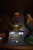 A vintage work top mountable coffee mill, A Kenrick and sons, having cast base and brass bowl.