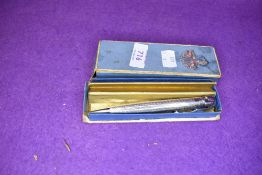 A mechanical pencil/lighter the Ronson Penciliter