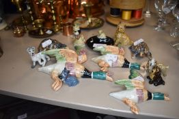 A selection of collectable figures and figurines including graduated ceramic duck wall set