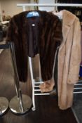 A light blonde vintage fur coat and a mahogany mink stole.