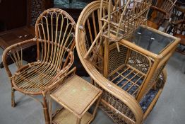 A selection of canework furniture including vintage magazine rack etc