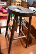 A traditional dark stained lab style stool, height approx. 59cm