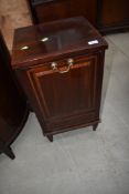 An Edwardian mahogany and inlay coal purdonium