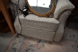 A modern electric recliner armchair
