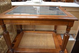 A modern stained frame glass top coffee table, approx. 69 x 54cm