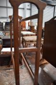 An Edwardian mahogany and inlaid towel rail, width approx. 70cm