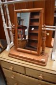A pine framed modern toilet mirror
