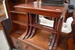 A reproduction Regency style nest of tables, some damage