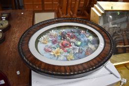 Two modern decoupages in vintage oval wood frames