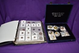 A large box of Coins in albums and display cases including Silver Threepences, Canada 1976 proof