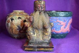 A mixed collection of vintage items including carved oriental figure and ,vase and planter