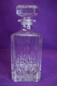 A vintage glass decanter.