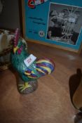 A Chinese cockerel figurine.