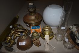 A pastry chefs brass roller and similar brass items and lighting
