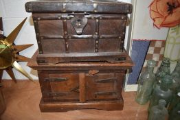 Two rustic styled wooden boxes one chest design and one open fronted cupboard style largest
